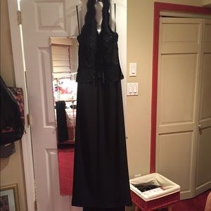 Gorgeous black gown. NEVER WORN, with tags. Size 8